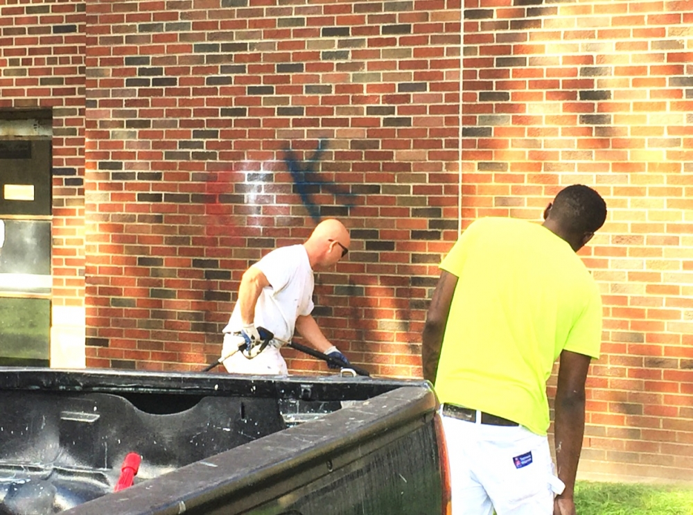 On Tuesday Sept. 20, around 9 a.m. graffiti was found on the outer wall of EMU's King Hall depicting hate speech. Picture taken after some writing was removed. (photo credit: Shayler Barnes Jr. / The Eastern Echo) 
